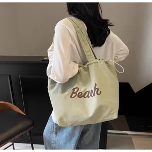 Bolso tote de lona verde claro para mujer, bolso de hombro informal y ligero.