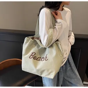 Bolso tote de lona de gran capacidad casual para mujer, elegante bolso de hombro de playa.