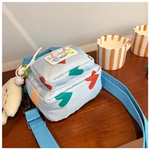 Cute cartoon canvas crossbody bag for women, trendy small shoulder bag for daily use