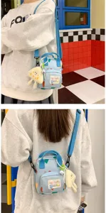 Cute cartoon canvas crossbody bag detail shot, stylish mini phone bag with geometric print.