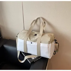 Spaziosa borsa da viaggio in tela kaki e bianca, ideale per palestra, sport e weekend.