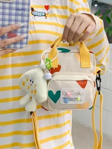 Summer cute cartoon canvas crossbody bag for women, trendy small shoulder phone bag with heart print.