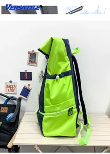 Detailed view of large capacity two-tone casual backpack with drawstring and front zipper pocket.