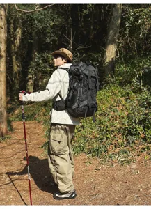 Outdoor hiking backpack detail view showing durable black fabric and large capacity design.