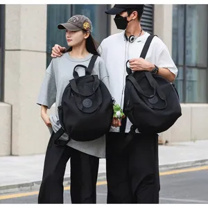 Grand sac à dos noir léger de grande capacité, cartable d'étudiant décontracté et de voyage.