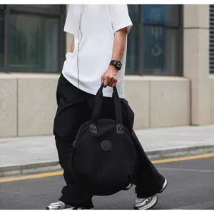 Sac à dos décontracté rond noir de grande capacité, sac de voyage tendance en nylon.