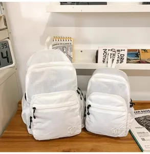 Lightweight waterproof grid backpack for women, packable folding travel and fitness daypack.