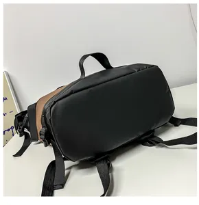 Casual black brown backpack detail shot, durable material, stylish daily travel school bag.