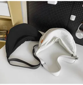 Casual large capacity crescent crossbody bag for daily use, simple solid color design.