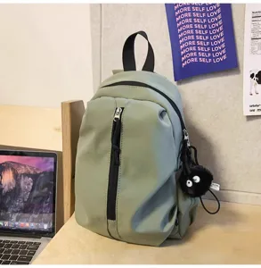 Lightweight casual green backpack for daily travel and school, featuring comfortable straps.