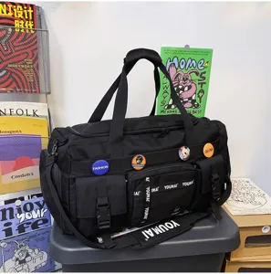 Grote reistas duffel bag voor dames en heren, zwarte sporttas met meerdere handige vakken.
