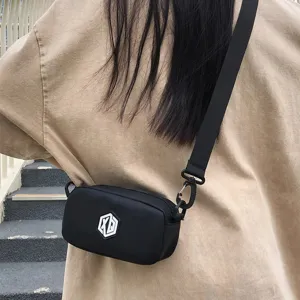 Black waterproof crossbody phone bag with adjustable strap and stylish hexagonal logo design.