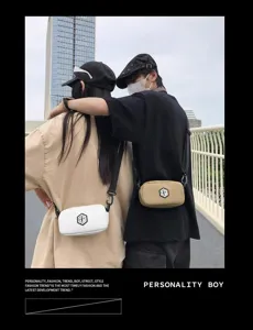 Casual waterproof crossbody bag for men and women, stylish small shoulder messenger bag.