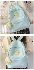 Zaino casual azzurro chiaro carino con toppa di frutta in peluche e ciondolo per studenti.