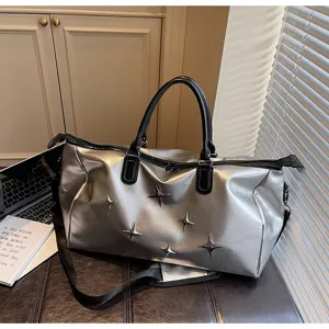 Silver metallic travel duffle bag with star rivets, large capacity gym handbag detail view.