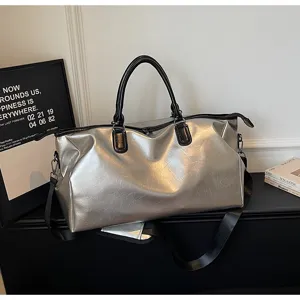 Women's silver travel duffel bag, large capacity lightweight portable gym and luggage bag.