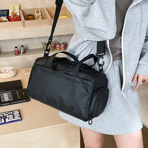 Black sports gym duffel bag waterproof travel shoulder bag lightweight portable design.