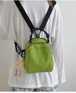 Casual green canvas backpack for women, lightweight multi-functional travel shoulder bag.