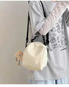 Lightweight canvas shell bag for women, casual single shoulder crossbody bag with zipper.