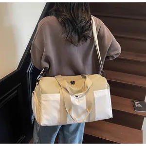 Borsa da viaggio bicolore casual con tracolla, ideale per sport, palestra e brevi viaggi.