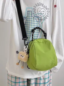 Green casual canvas shell shoulder bag for women, lightweight travel crossbody bag.