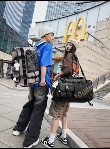 Stylish large capacity tactical gym duffel and backpack set for travel and sports use.