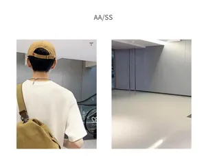 Vue détaillée du sac bandoulière décontracté en toile, avec tissu résistant et détails de sangle.
