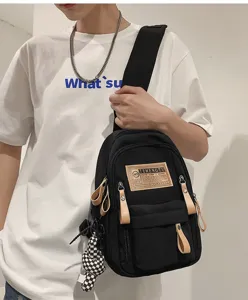 Black canvas chest bag for men and women, casual stylish streetwear crossbody sling backpack.