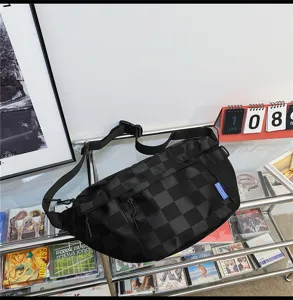 Trendy checkered sports crossbody bag with adjustable strap and spacious capacity for daily wear.