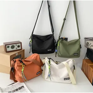 Casual canvas crossbody bag for women and men, stylish solid color shoulder bag daily use.