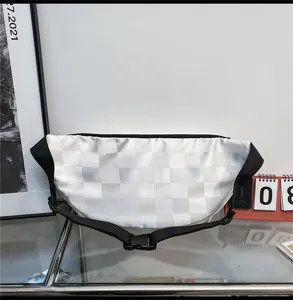 White checkerboard chest bag casual sports crossbody bag with black adjustable strap detail.