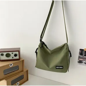 Japanese solid color canvas crossbody bag casual messenger bag for women and men daily use