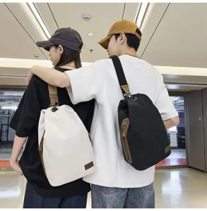Sac bandoulière en toile décontracté pour hommes et femmes, sac de poitrine rétro spacieux.
