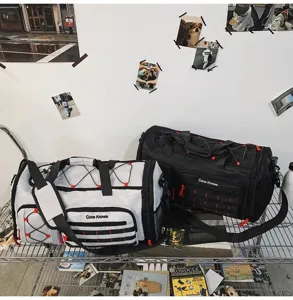 Detailed view of large capacity multi-functional travel gym duffel bag with shoulder strap.