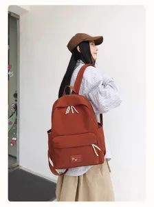 Casual canvas backpack detail view, featuring lightweight design and convenient pockets for daily commuting.