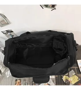 Grand sac de sport noir étanche avec compartiment séparé pour voyage fitness entraînement.