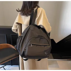 Zaino da viaggio casual in nylon di grande capacità con spazio di archiviazione multifunzione.