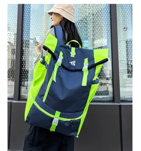Large capacity contrast color outdoor backpack detail view showing adjustable straps and buckles.