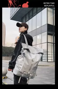 Detailed view of the large capacity trendy roll-top backpack, showing outdoor travel design.