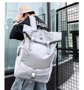 Grey large capacity roll-top backpack detail, multi-pocket outdoor sports travel bag.