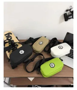 Small crossbody bag for women and men, stylish portable waterproof single shoulder bag.