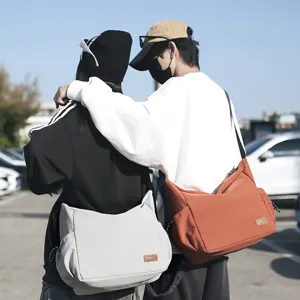 Large capacity canvas crossbody bag casual versatile shoulder messenger bag for daily travel.