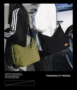 Large capacity canvas messenger bag casual shoulder travel crossbody bag for men and women.