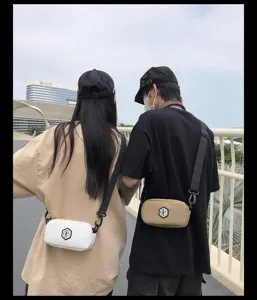 Compact casual crossbody bag for men and women, ideal for daily outdoor usage.