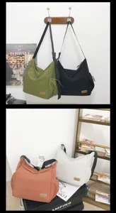 Casual canvas shoulder bag detail showing multi-color options and large daily capacity.