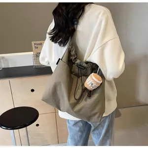 Bolso tote casual de lona para mujer gran capacidad con bonito colgante de peluche incluido.