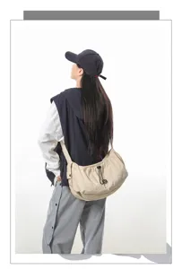 Detailed view of the casual lightweight crossbody shoulder bag demonstrating practical daily wear.