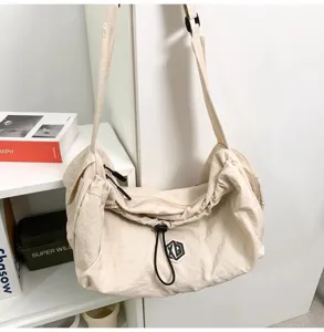 Lightweight casual nylon crossbody bag for travel and outdoor activities, large capacity.