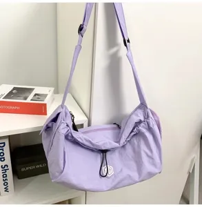 Lightweight purple travel shoulder bag, casual crossbody gym bag for daily outdoor use.