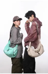 Casual nylon crescent shoulder bag, large capacity travel crossbody bag for men and women.